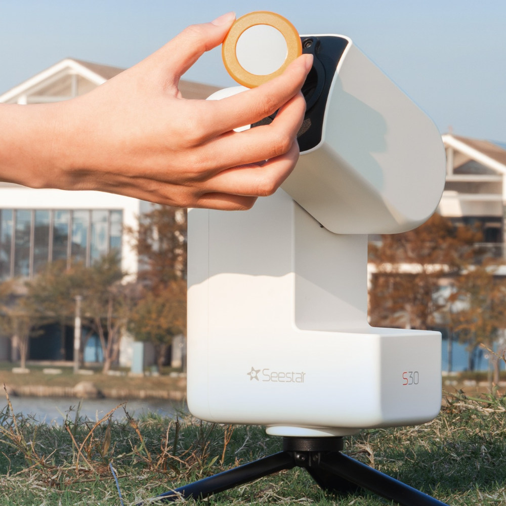 Image showing the Seestar S30 All-in-One Smart Telescope with its magnetic solar filter attached