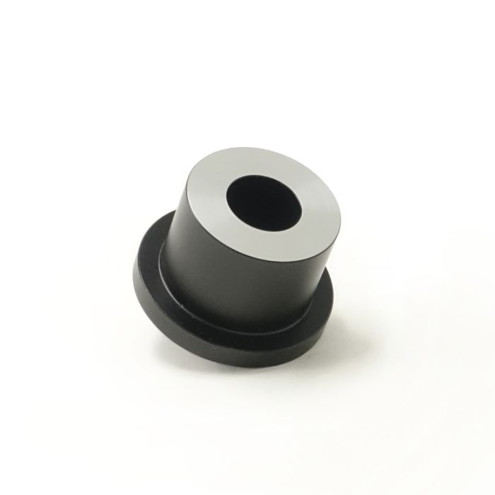 Apertura 1.25 Inch Collimation Cap placed upside-down and at an angle so that the gleaming polished ring is pointing directly towards the camera.